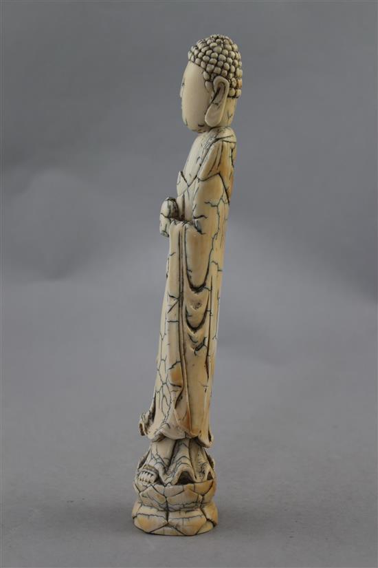 A Chinese ivory tusk carving of Buddha, Qing dynasty, 23.5cm.